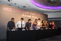 Exchange students are challenged on their chopstick skills.